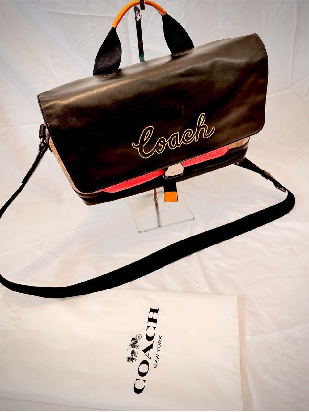 Coach Black Leather Messenger Bag with Pink Accent and Orange Handle Trim